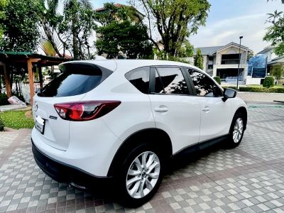 ขายถูกมากคุ้มจริง Mazda CX-5 2.2 AWD Diesel ปี2014 สีขาว รถบ้านแท้ๆ บอดี้สวยเดิมทั้งคัน เจ้าของขายเอง ดูแลอย่างดี มั่นใจสภาพดีเยี่ยม ตัดใจขายเพราะไม่มีที่จอด พร้อมนัดชม รูปที่ 2